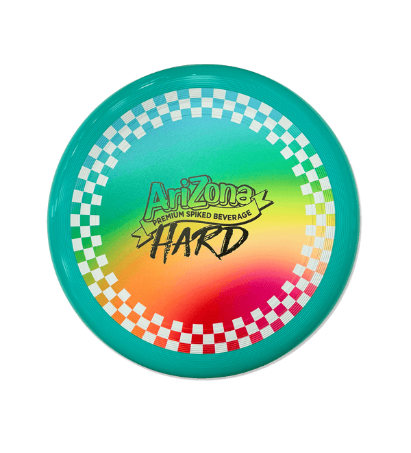 An Arizona Premium Spiked Beverage HARD Frisbee on a solid black background. The disc features a vibrant teal outer rim, a green-to-orange gradient center, a red-to-orange gradient bottom section, and a white and teal checkered ring around the outer edge.