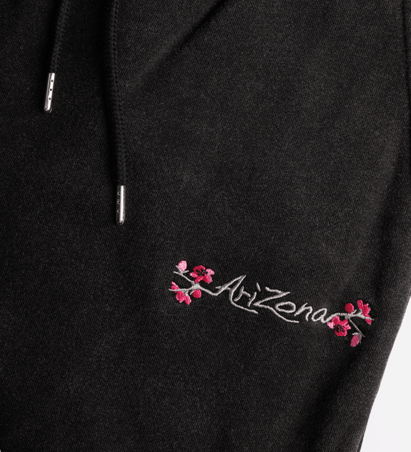 Black Cherry Blossom Sweatpants Close-up Front Image