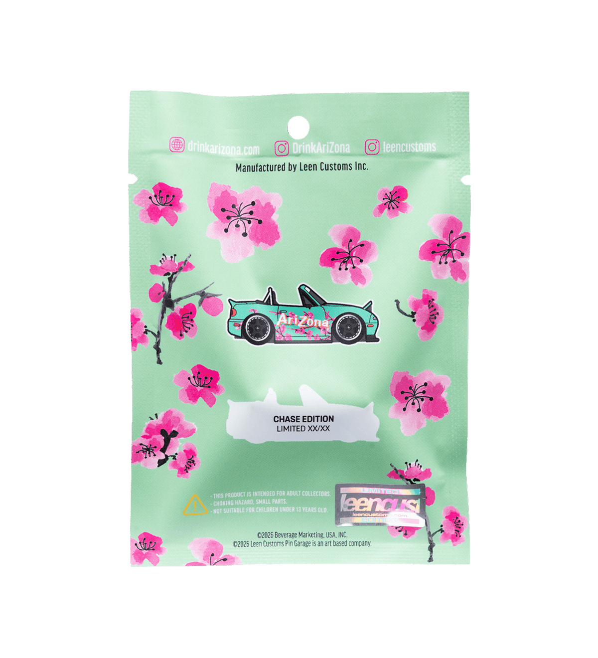A mint green collectible sticker card featuring pink cherry blossom illustrations and a teal sports car with 'ArtZone' branding. The card includes text reading 'CHASE EDITION LIMITED STICKER' and a 'peppers' logo at the bottom, photographed against a solid black background.