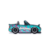 A turquoise and pink floral convertible car enamel pin with 'AirZona' text on the side, shown against a solid black background.