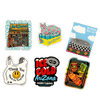 Set of colorful stickers featuring various designs on a black background