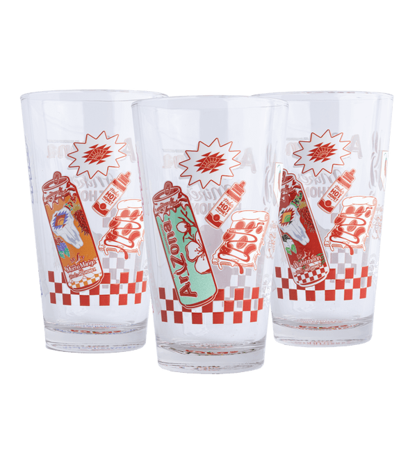 Three glass pint glasses with Mikes Hot honey branded graphics
