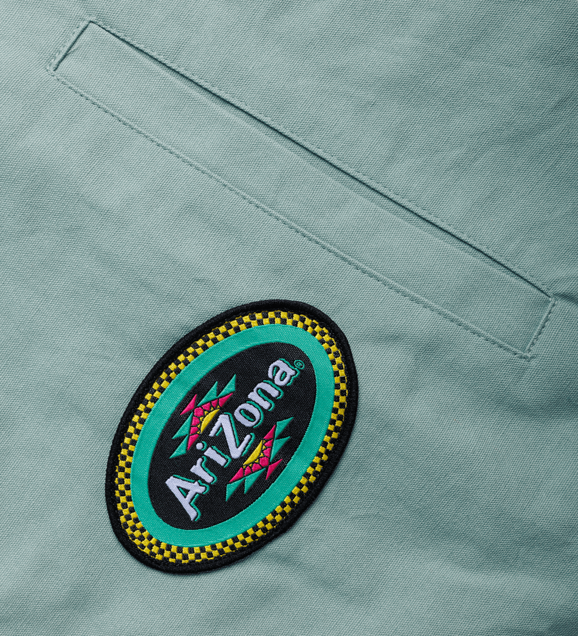 Teal Heritage Work Shirt Front Logo Close-up Image