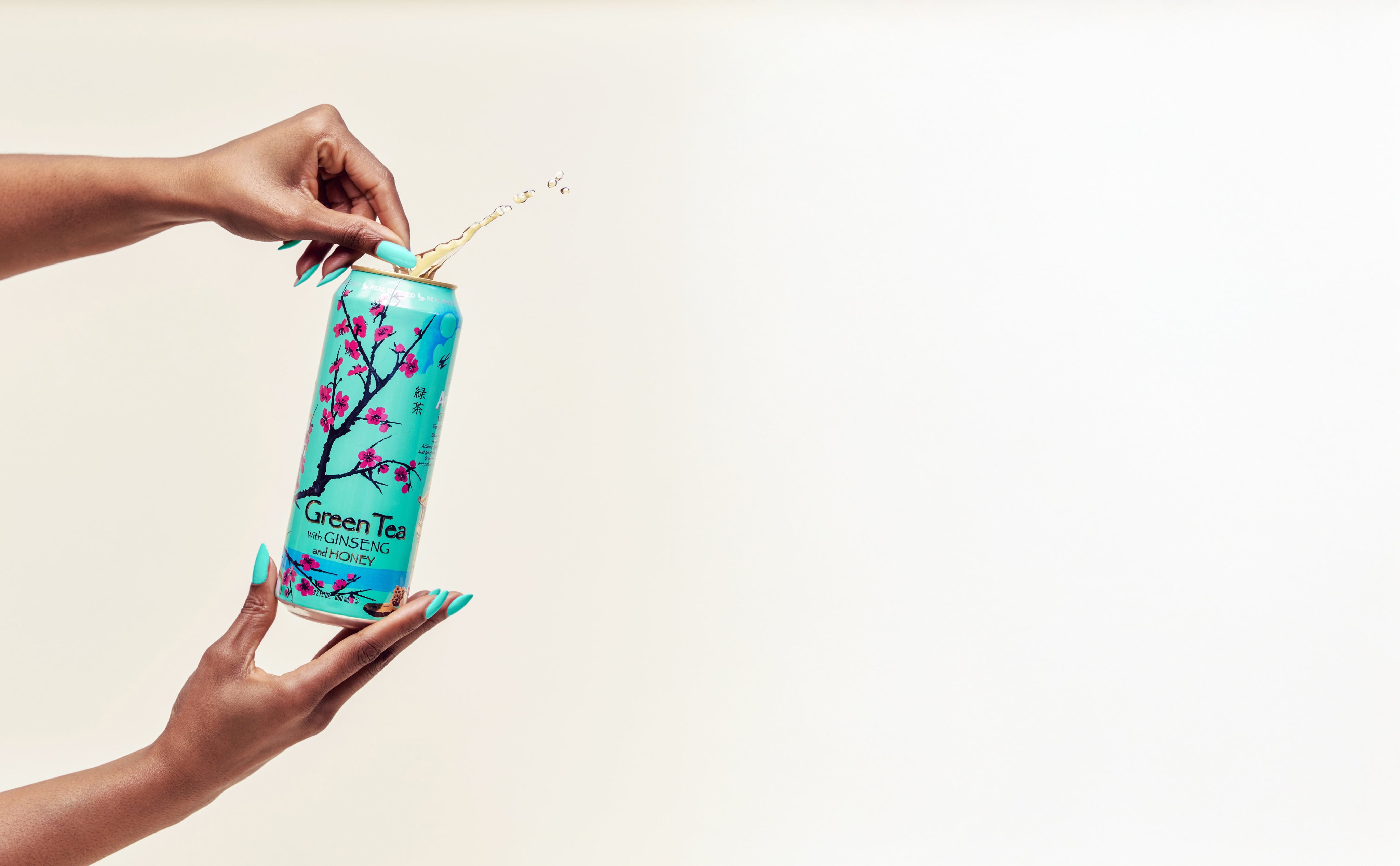 open green tea can image