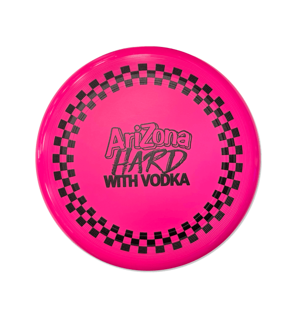A bright pink Arizona Hard with Vodka disc Frisbee  on a solid black background.