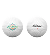 Two golf balls, one with 'Arizona' logo and the other with Titleist branding, on a white background.
