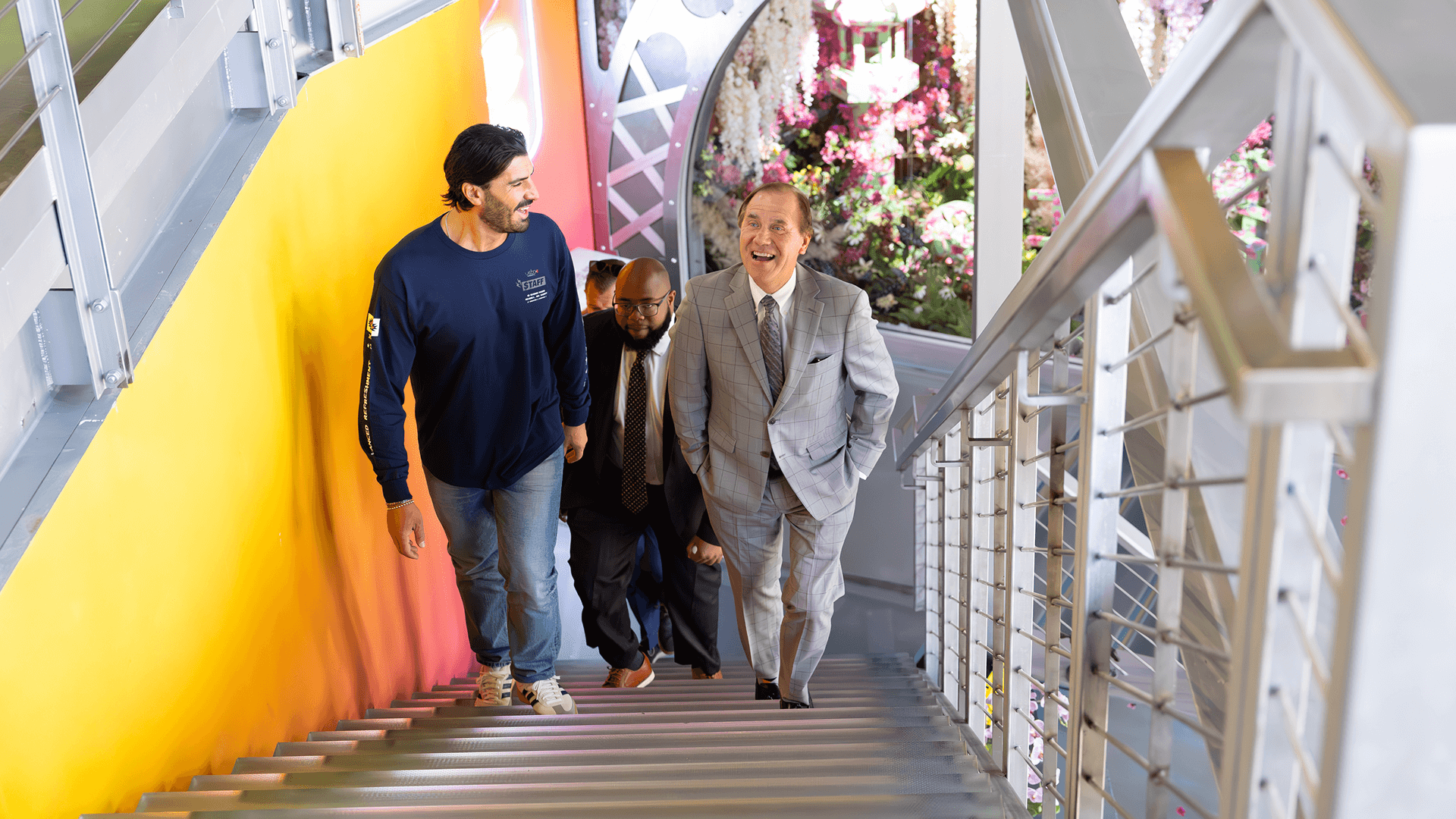 People walking up set of stairs in AriZonaLand