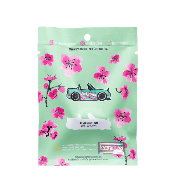 A mint green collectible sticker card featuring pink cherry blossom illustrations and a teal sports car with 'ArtZone' branding. The card includes text reading 'CHASE EDITION LIMITED STICKER' and a 'peppers' logo at the bottom, photographed against a solid black background.