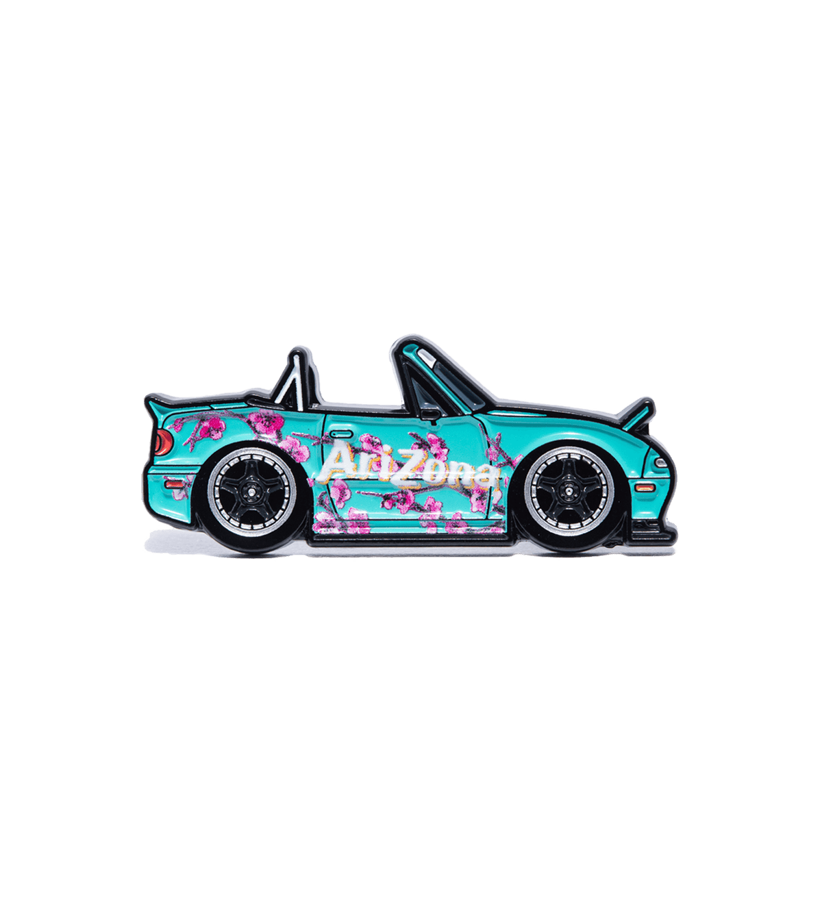 A turquoise and pink floral convertible car enamel pin with 'AirZona' text on the side, shown against a solid black background.