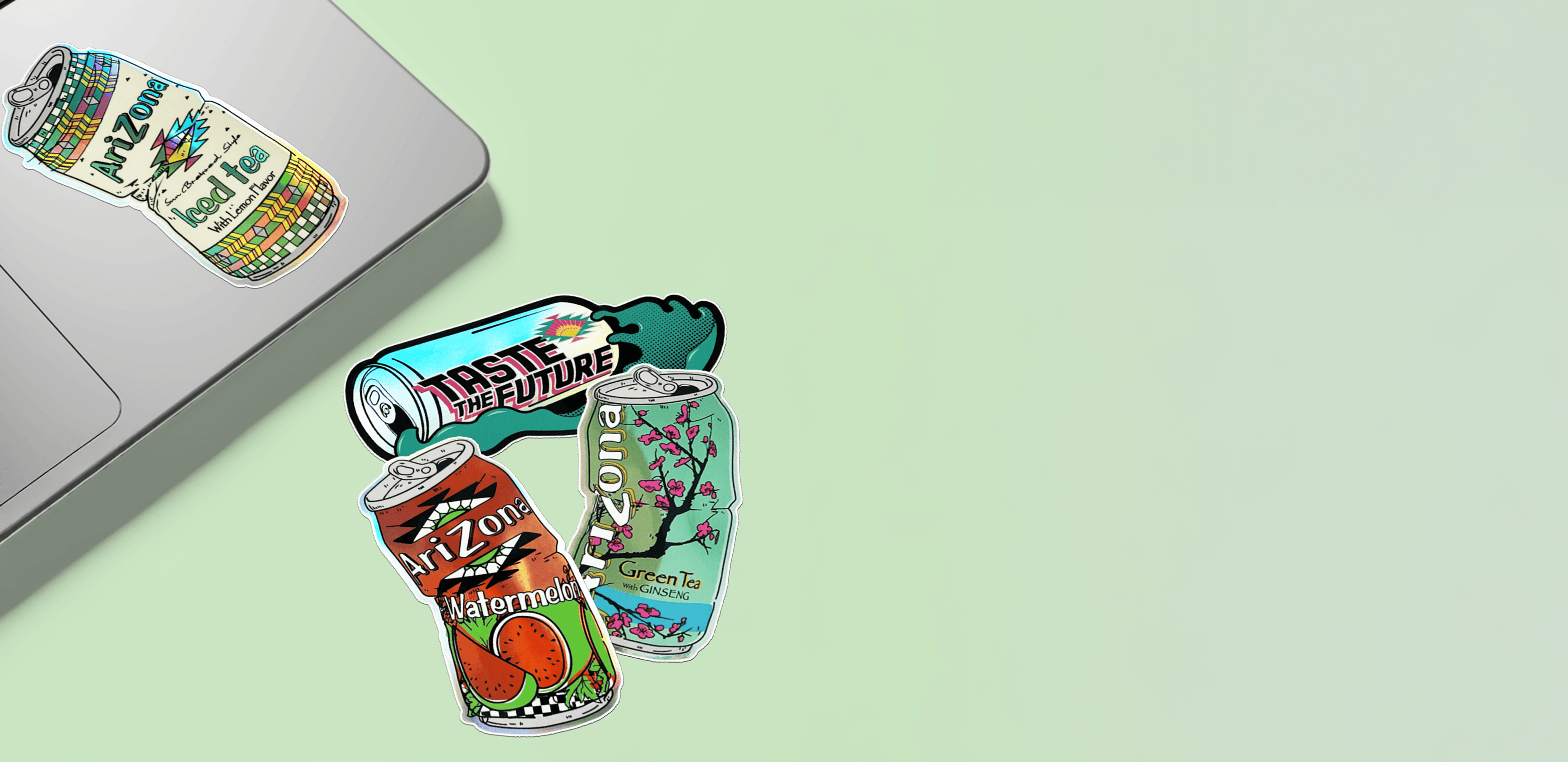 Colorful AZ can stickers on a green background