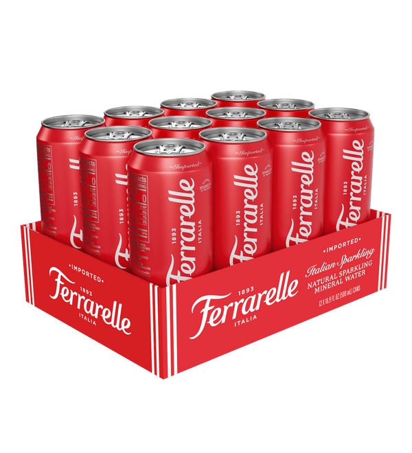 A 12-pack of Ferrarelle Classic Sparkling Water aluminum cans in a red cardboard tray, photographed against a solid black background.