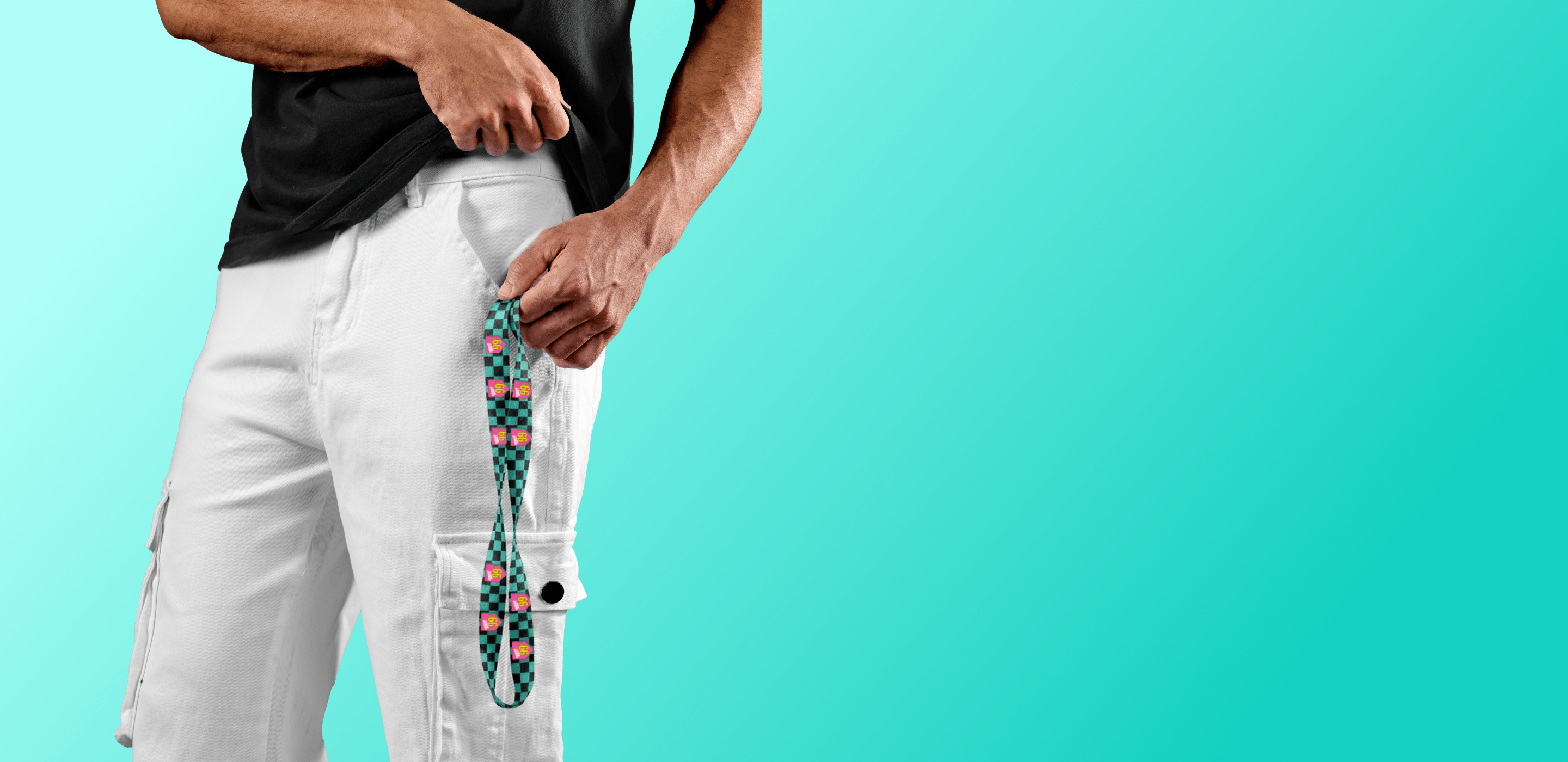 Person wearing white pants with a colorful lanyard against a teal background